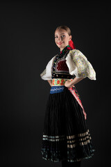 Beautiful woman wearing traditional Eastern Europe folk costumes. Slovak folk costumes.