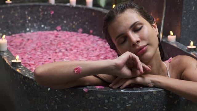 exotic beauty and relax treatment in spa salon, woman in bath