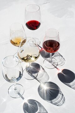 wine glasses with different types of wine