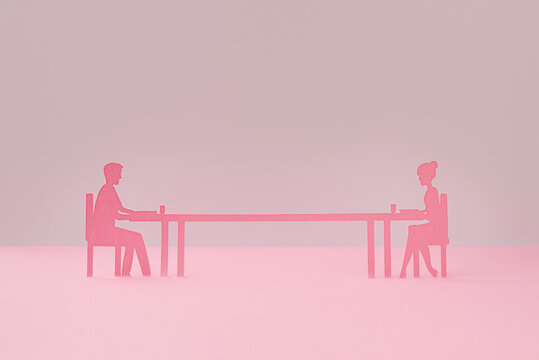 Couple dinner in a long table