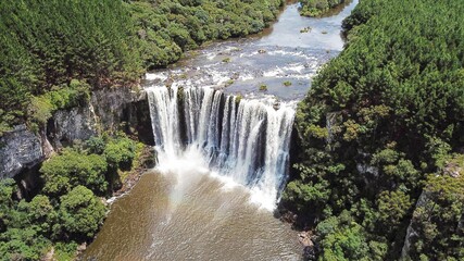 Aerial view of the Rio Cerquinha waterfall, in Bom Jesus, Rio Grande do Sul, Brazil. Beautiful waterfall among the green forest in Brazil