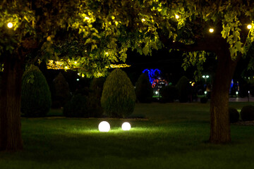 illumination backyard light garden with ground lanterns with round diffuser lamp and garland of...