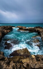 waves crashing on rocks