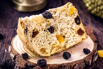 large slice of panettone, typical candied fruit bread, a Brazilian and Italian Christmas dessert