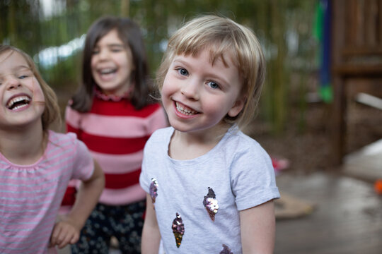 Three Pre-school Friends Laughing Together