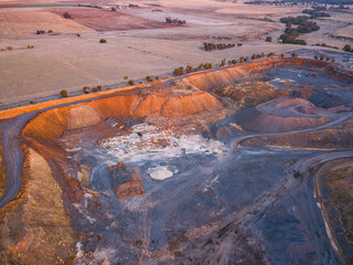 Aerial view of large quarry pit