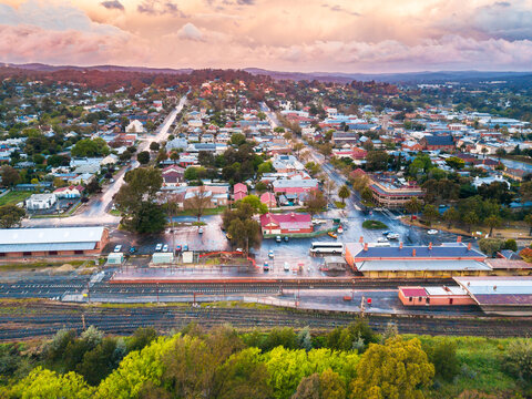 Colourful stormclouds over the railway station and streets of a country town