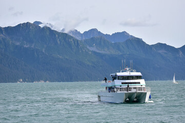 A sightseeing cruise returns to the Seward, Alaska, harbor after a day on the waters of Resurrection Bay.
