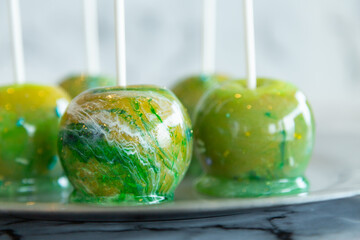 marbled green toffee candy apples on sticks