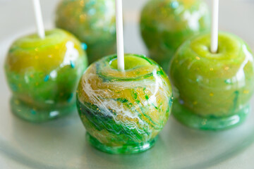 marbled green toffee candy apples on sticks