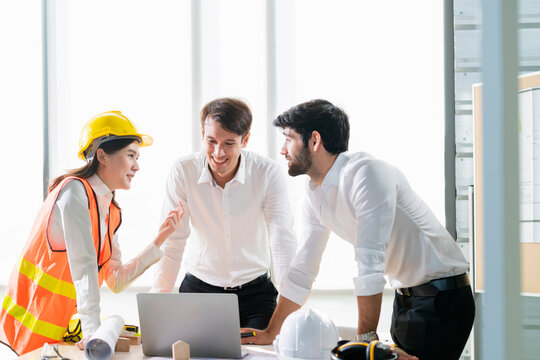 Group of asian and caucasian young creative happy enjoy laugh smile and great success emotion teamwork people engineer consultant entrepreneur casual brainstorm business meeting office background