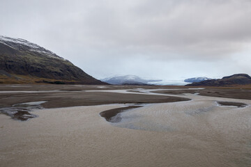 Fototapeta na wymiar meltwater runoff in the mountains of Iceland
