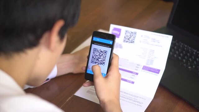 Utility bill online payment using QR code and mobile app. QR Code Scanner and Mobile Payment System. Scanning and contactless paying on smartphone
