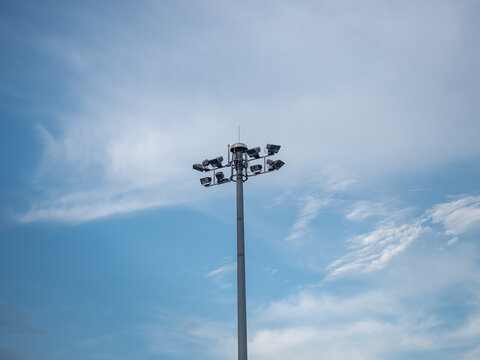 Spot light pole and the beautiful clouds and sky at airport. spotlight with radio control. 
