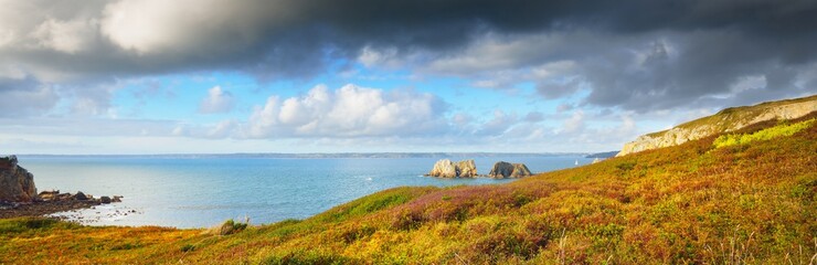 Panoramic view of an ocean coastline at sunset. Pointe de Toulinguet, Brittany, France. Dramatic...