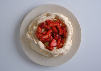 Australian Pavlova Meringue Cake, filled with Chantilly Cream, Dulce de Leche and Strawberries