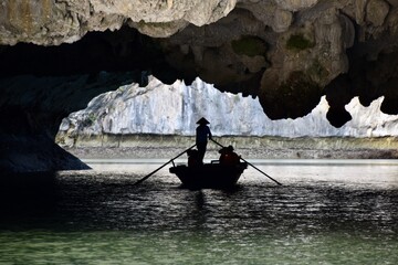 Local Rowboat Operator in Silhouette in Cave, Lan Ha Bay, Vietnam 2
