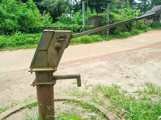 Old Hand operated water pump in Indian rural area.