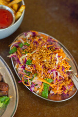 Coleslaw on a metal plate