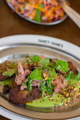 Vegan barbecued eggplant and greens