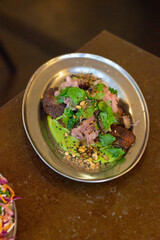 Roasted eggplant with green sauce