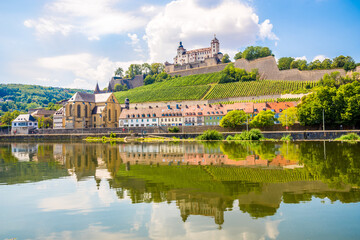 Fototapeta na wymiar View at the Bank of Main river with Marienberg Castle and At.Bukard church in Wurzburg ,Germany
