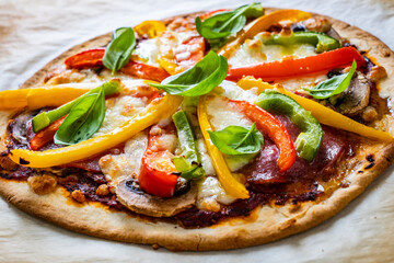 Margherita pizza on baking paper

