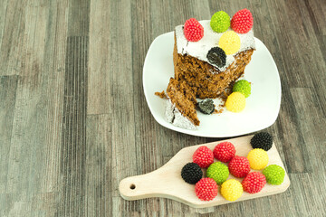 A piece of chocolate cake with shortcrust pastry nuts