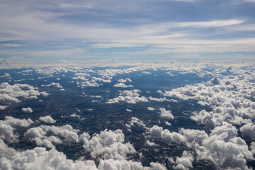 Fototapeta na wymiar Aerial view landscape of Bangkok city in Thailand with cloud from aerial view airplane.