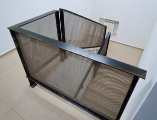 Metal handrails on the stairs in the house. 