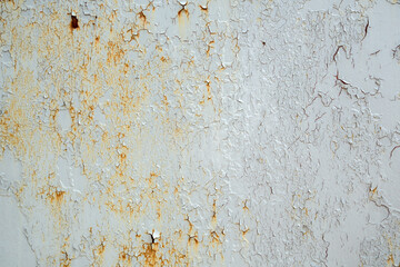 Texture of old cracked, peeling, shabby paint close-up. Background