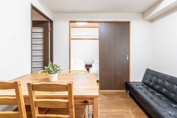 Brown wood dining table in the living room of an old Japanese-style house