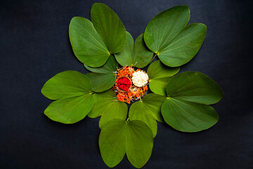 Indian festival dussehra , green leaf, rice and flowers