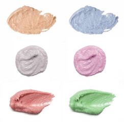 Cosmetics and makeup samples on white background