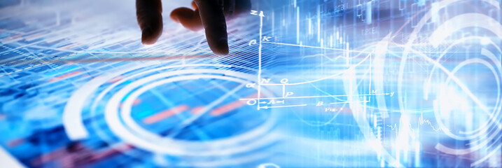 Business concept. Information technology and data processing. Hands over the screen with graphic data. A modern software product in business.