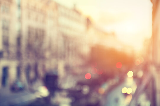 Blurred city background. Cityscape of Paris at sunset, France. 