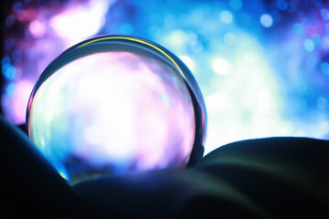 Astrological background. Crystal ball with predictions. Horoscope of the stars. Fortune telling and determination of fate. Soothsayer with a crystal ball.