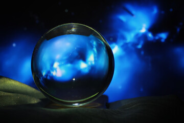 Astrological background. Crystal ball with predictions. Horoscope of the stars. Fortune telling and determination of fate. Soothsayer with a crystal ball.