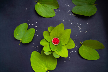 Indian festival dussehra , green leaf, rice and flowers