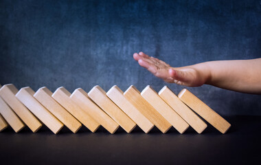 The child plays with wooden sticks, holds with his hand. The concept of training and education of young children.