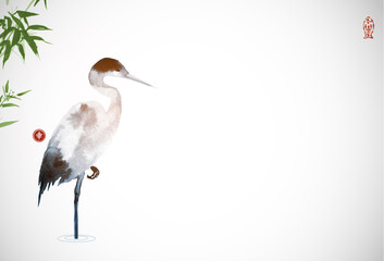 Heron and green bamboo leaves. Traditional oriental ink painting sumi-e, u-sin, go-hua. Translation of hieroglyph - happiness
