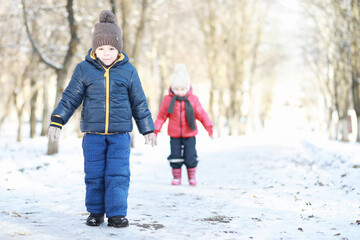 Children in winter park play