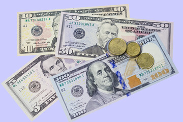 Various paper banknotes dollars and metal coins cents