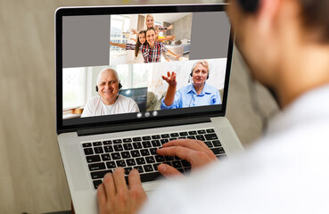 A man using a laptop computer