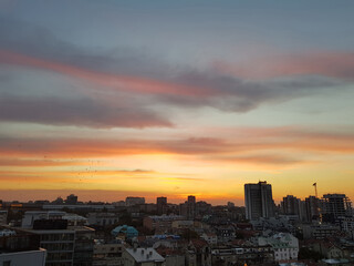 Sunset over Belgrade with orange-gray shades of the sky