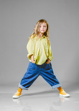 portrait of little model girl in studio