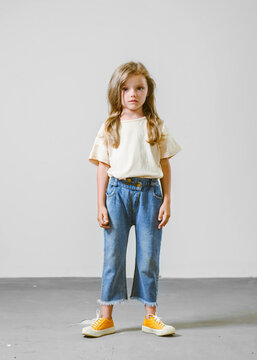 portrait of little model girl in studio