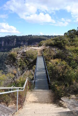 The cliffs and the hiking trails in the Blue Mountains national park in Australia on the sunny winter day