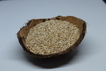 Organic natural Til Gul OR Sesame seeds over white background