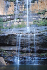 Obraz premium Hiking hear waterfalls in Wentworth Falls in Blue Mountains national park, Australia